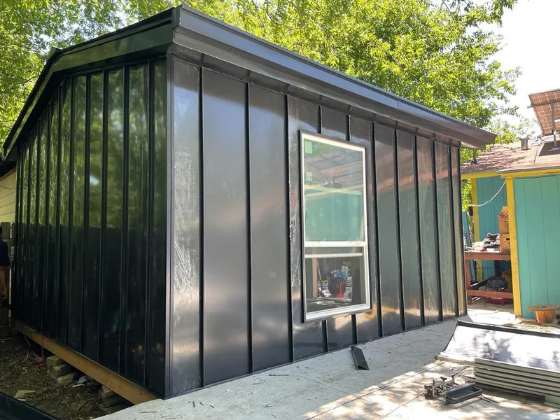 Black standing seam metal wall panels for Metal Roof Installation in Pecan Plantation