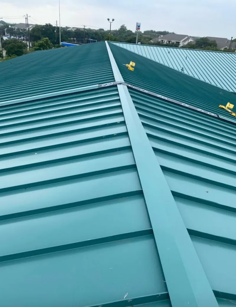 Green commercial metal roof ridge and valley for Metal Roof Repair in Pecan Plantation